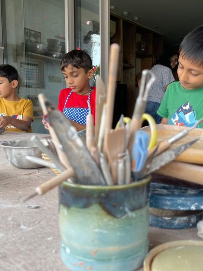 A close-up of the kids' workstation, with all the tools of the trade ready for them to get creative.