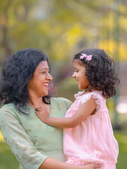 A moment of pure, unscripted joy between a mother and her daughter during an outdoor lifestyle session. Our goal is to capture these authentic interactions that truly reflect your family's love and happiness.