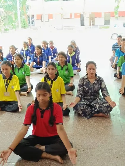 Students practicing meditation during one of our outreach programs in schools. We aim to nurture the next generation with the timeless wisdom and light of Yoga.
