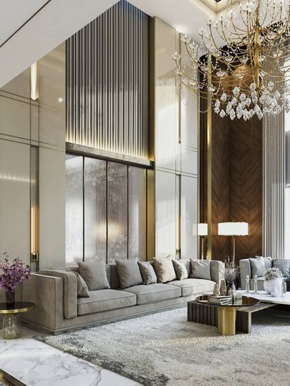 Two perspectives of a luxurious lobby and seating area. The renders highlight the dramatic geometric flooring, a statement chandelier, and the double-height ceiling, conveying a sense of five-star elegance.