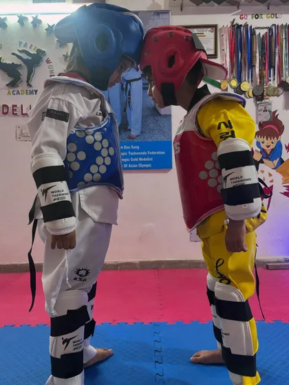 The moment before the match. This is where focus and discipline take over. I prepare my students not just to fight, but to face their challenges with courage, head-on.