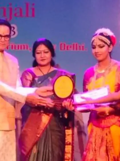 Here is our team from Nritya Gurukul receiving a group prize at the Nrityanjali festival. We won a total of nine prizes in the sub-junior and junior categories, which speaks volumes about the talent and training at our school.