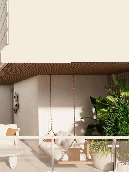 A cozy corner of the terrace, featuring a swing and comfortable seating, perfect for relaxing.