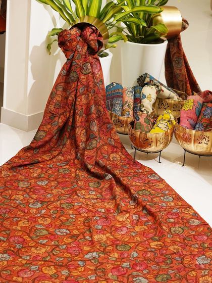 This is a glimpse into my Kalamkari Edition, featuring a wide array of hand-painted dupattas and fabrics from the Indralokam series. Each piece is a unique story, available for you to customize into your dream outfit.