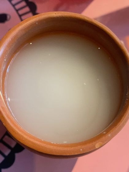 A refreshing welcome drink from the Bastar festival, made from local ingredients, offering a true taste of the region.