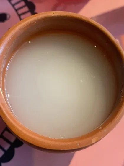 A refreshing welcome drink from the Bastar festival, made from local ingredients, offering a true taste of the region.