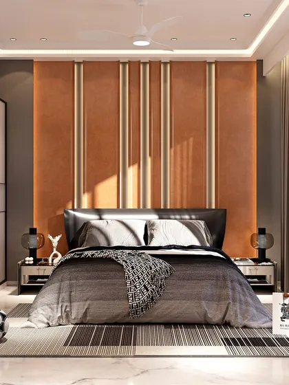 A wider view of the bedroom, showcasing the custom headboard with vertical metallic inlays against a tan backdrop. The room features sliding glass wardrobe doors and direct access to a balcony, blending warmth with modern functionality.