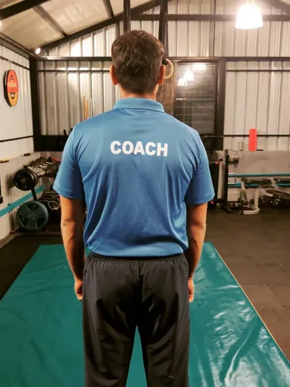 Simple and clear. I am a hands-on coach, always on the floor with my students, pushing them to be their best. This is our training space where the hard work happens.
