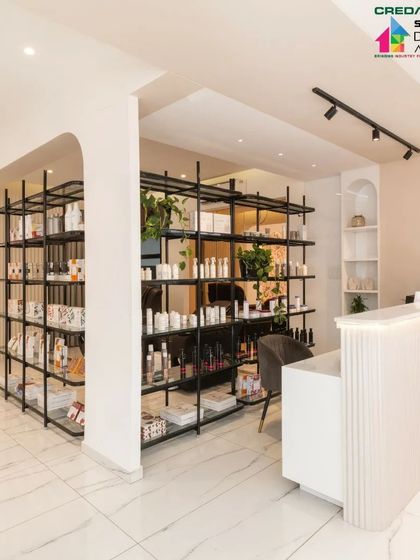 A view from behind the reception desk, looking out into the salon.