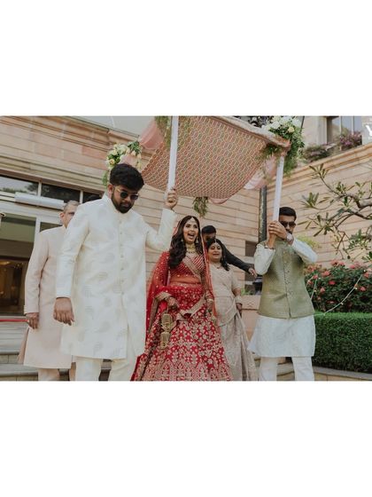 Another shot of her entrance, surrounded by her loved ones. It’s a moment of pure celebration.