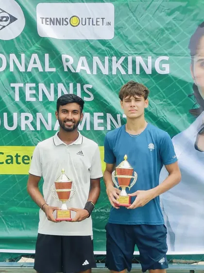 Anup Bangargi, on the left, with his partner after winning the doubles title at the 1 Lac All India Men's Open Tournament in Hyderabad.