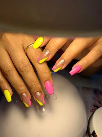 Another look at the neon pink and yellow set, perfect for a bold summer statement.