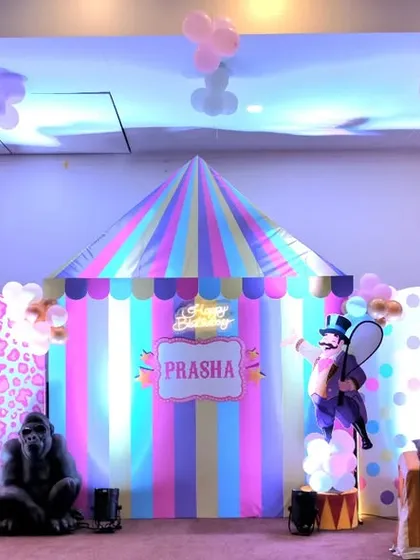 Step right up to a pastel circus carnival! This full stage setup for a 6th birthday shows our love for detail, featuring a custom circus tent backdrop, shimmering panels, and playful animal props to bring a child's imagination to life.