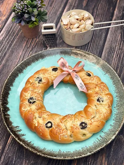 My Jalapeño Olive Cheese Wreath is another popular savoury bread for the holidays. It's braided and baked into a festive wreath shape.