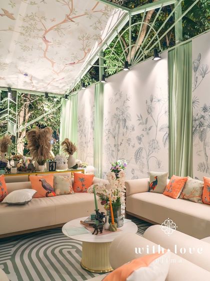 The lounge area of 'The Conservatory' at night, showing the beautiful interplay of light, texture, and color.