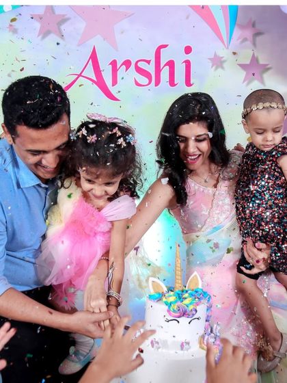 A vibrant 'Encanto' themed birthday party, with colorful floral decor, character cutouts, and a custom backdrop of the magical casita, bringing the magic of Colombia to your event.