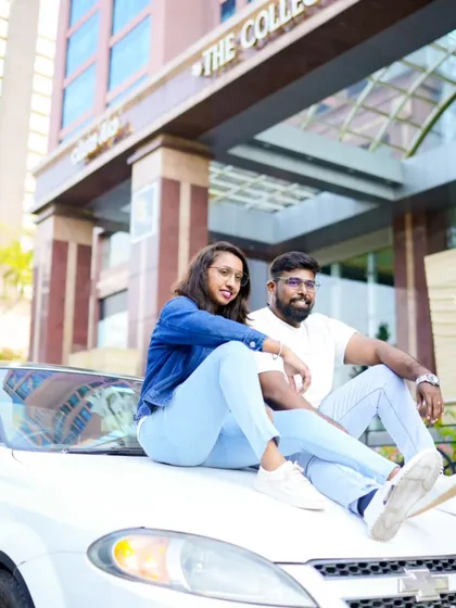 A fun and unconventional pose on the hood of a car. This adds a bit of urban edge to your pre-wedding album.