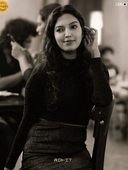 A sepia-toned shot of a guest at her table.
