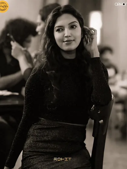 A sepia-toned shot of a guest at her table.