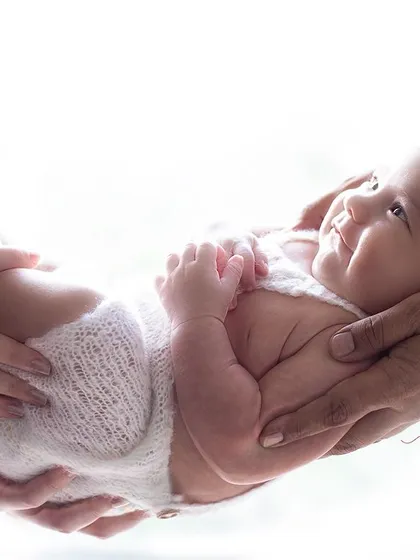 There is a special kind of magic in a newborn's first few days. I focus on creating a safe and gentle space to capture these peaceful, fleeting moments, preserving the memory of just how small they once were.