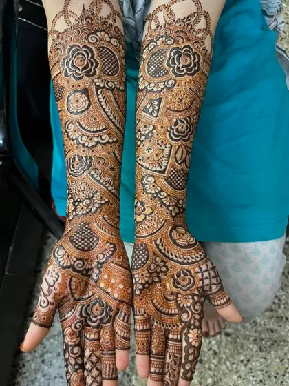 A beautiful and intricate design with floral and peacock elements.