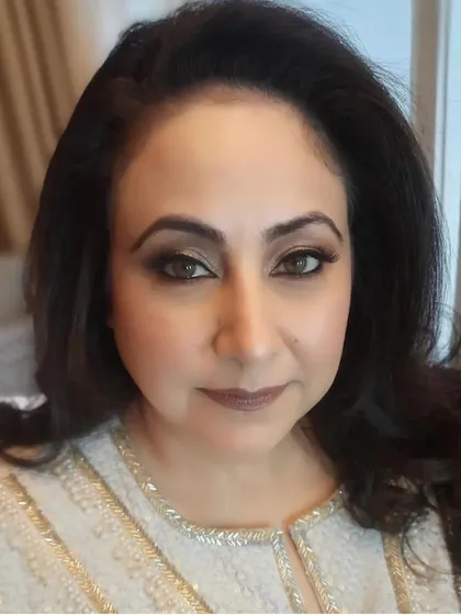 A direct portrait showcasing the final makeup for our client. The look is timeless and graceful, ensuring she looks her best in all the family photographs.