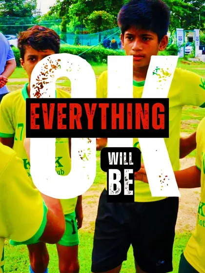 "Everything will be okay." A huddle of players embodies our belief that teamwork and passion are more important than the score.