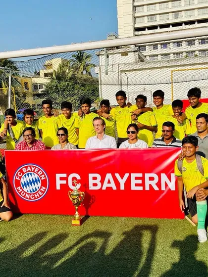 I manage high-profile youth tournaments like the FC Bayern Munich Maharashtra Cup. Here, the winning St. Stanislaus team celebrates their victory, showcasing the professional and prestigious atmosphere I create for young athletes.