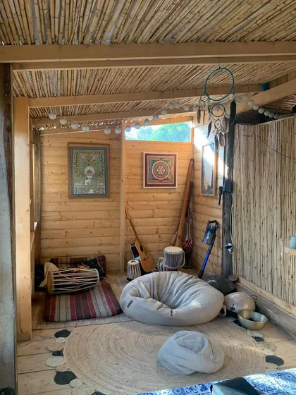 A quiet corner for meditation and kirtan inside one of our retreat spaces in Italy. We create a spiritual atmosphere with traditional instruments like the tabla and harmonium.