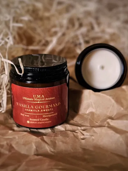 The 'Vanilla Gourmand' candle shown with its lid off, revealing the smooth, hand-poured soy wax. This delightful aroma is a must-have from my Gourmand collection.