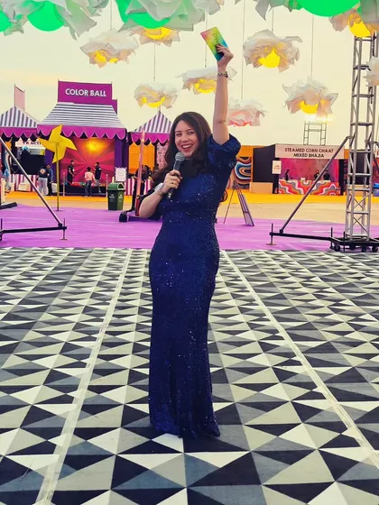 A wide shot showing me on the massive stage of the carnival, ready to kick off the festivities.