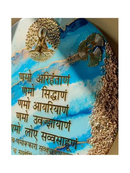 These images showcase my round Navkar Mantra frame, featuring a stunning blue ocean resin design with gold geode edges. It's a modern and artistic way to display this powerful Jain mantra.