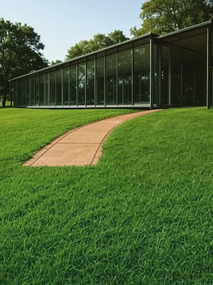This image highlights how a simple pathway can lead to a striking glass structure, making it an integral part of the garden design. We aim to integrate our prefab rooms as natural extensions of your landscape.