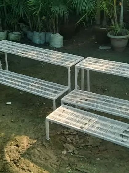This is my 2-stair table design stand, available in different lengths. It's a simple and strong metal stand, perfect for arranging a line of pots along a wall or balcony. Order now for quick delivery in Ghaziabad and Noida.