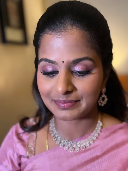 The lovely Akshaya, sister of the groom, for the engagement. We did a beautiful look with shimmery pink eyes and a matching lip.