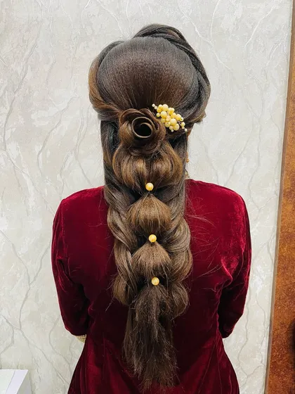 A clear view of the complex structure of this modern braided hairstyle, showcasing the skill and artistry involved.