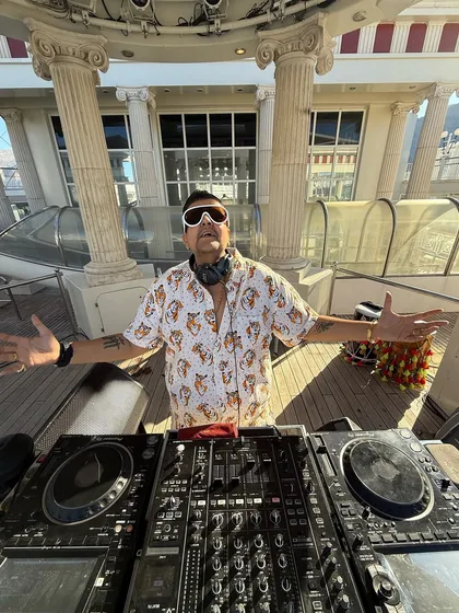 A shot of me at the console on the deck of the cruise ship during our Dubai-Muscat-Oman tour. DJing with an ocean view is an experience like no other.