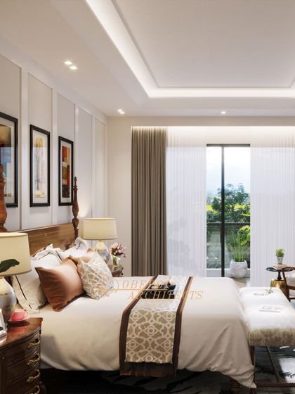 Another view of the bedroom, showcasing the classic wall art and the beautiful view from the large window.