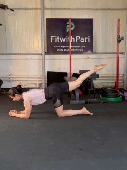 A forearm plank with a leg lift. Lifting one leg while in a plank forces the core to work harder to prevent the hips from rotating.