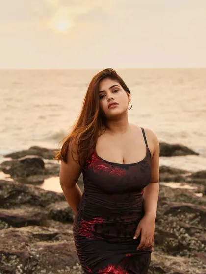 A close-up portrait from a golden hour beach shoot in Mumbai. The warm light and natural expression capture a candid, authentic moment, showing how I connect with subjects to bring out their personality.