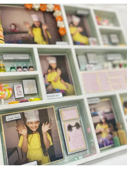 A tilted view of the baker's frame, showing the depth and detail that goes into creating these 3D story boxes.