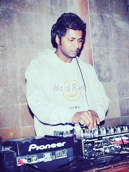A nostalgic throwback to my earlier days, wearing a Hard Rock Cafe hoodie. My journey as a DJ has been a long and passionate one.