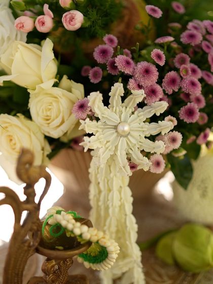 A handcrafted 'gajra' flower, a beautiful traditional element incorporated into the modern decor.