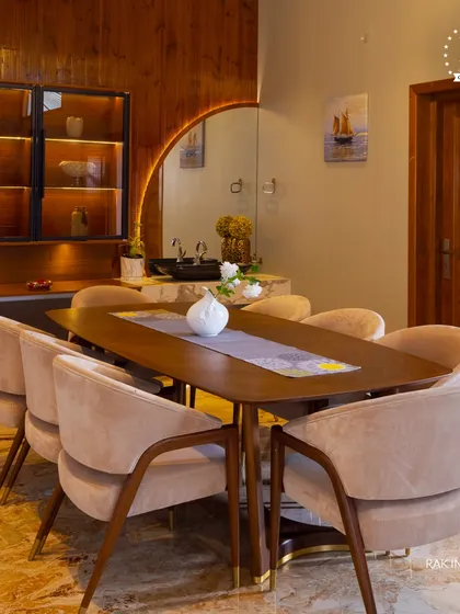 The dining room is where you connect with family and friends. We design these spaces to be warm and inviting, using elements like rich wood tones, plush seating, and statement lighting to turn every meal into a cherished moment.