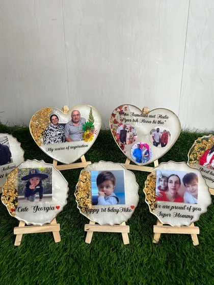 A collection of my custom resin photo frames, perfect for any occasion. From a baby's first birthday to a graduation gift, I can personalize each frame with photos, dates, and special messages to create a lasting keepsake.