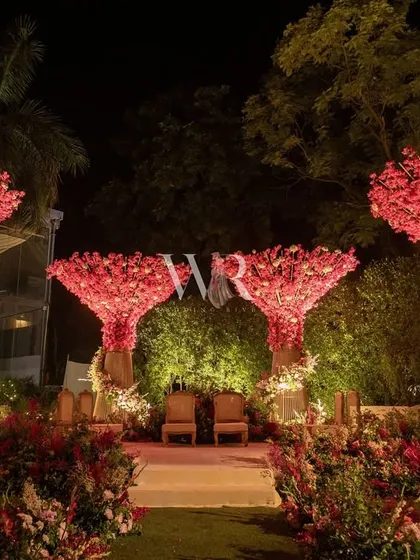 A mandap should be as unique as the love it celebrates. I designed this modern yet whimsical altar with sculptural floral trees, creating a blooming pink paradise that felt both artistic and deeply personal, a perfect sanctuary for the wedding vows.