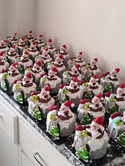 My entire kitchen counter filled with mini Santa-in-a-chimney cakes! These were part of a huge Christmas hamper order, and each one was individually handcrafted and decorated. It was a true Christmas marathon!