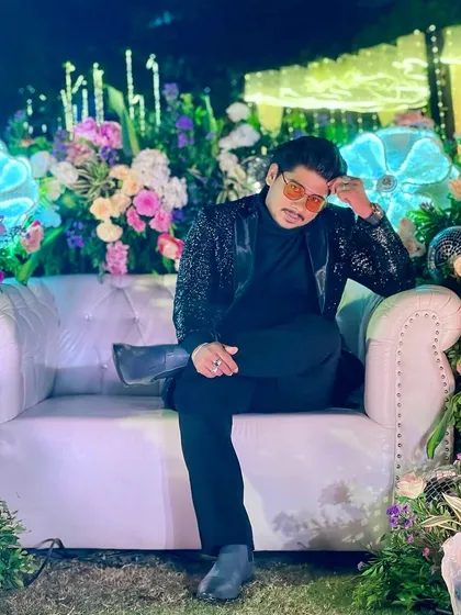 "To sit on the throne full of roses, you must also bear the thorns." A shot of me relaxing between hosting duties, reflecting on the grit and effort that goes into creating elegant events.