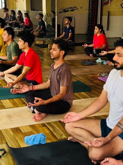 A wide view of my class during a meditation session. You can see the focused and peaceful atmosphere we cultivate in our studio.