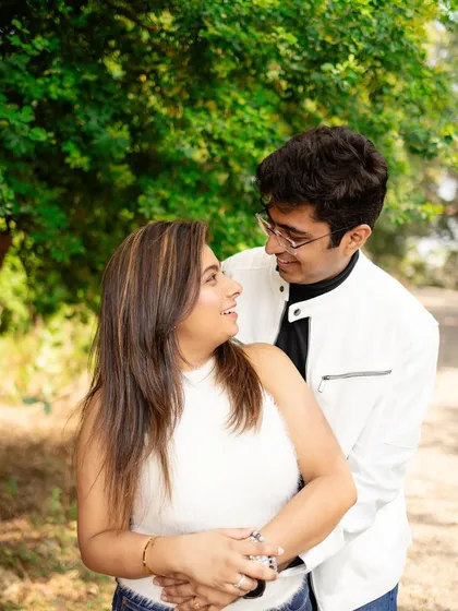 A casual and sweet look for a daytime pre-wedding shoot. I styled her hair straight and kept the makeup very natural and minimal to match their relaxed white outfits.